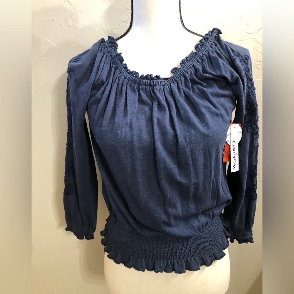Navy blue long sleeve top.